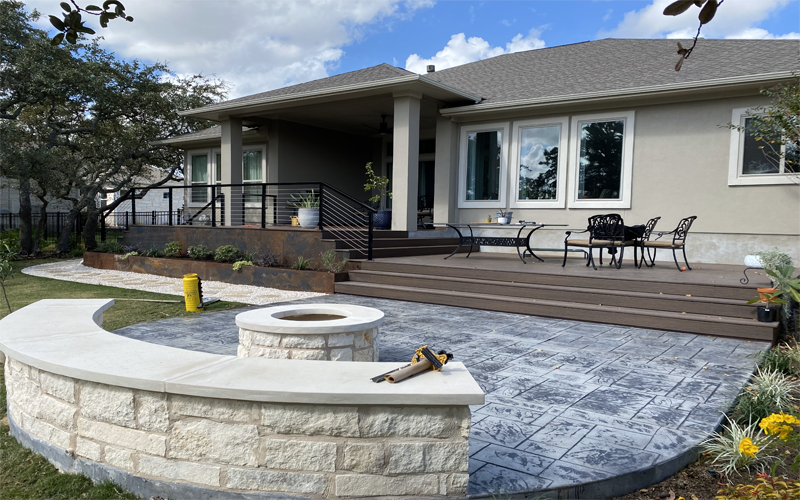 Patio and deck in the outdoor spaces done by Austin landscapers.