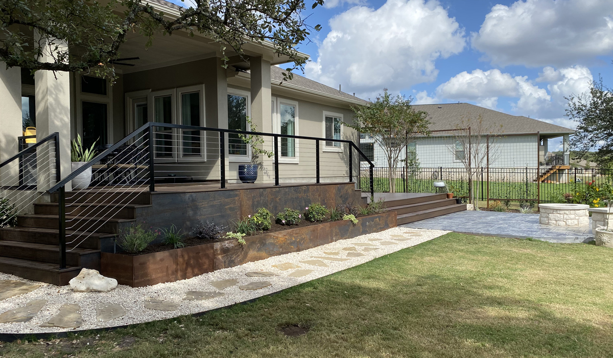 Austin Landscaping: beautiful home curb with large front yard