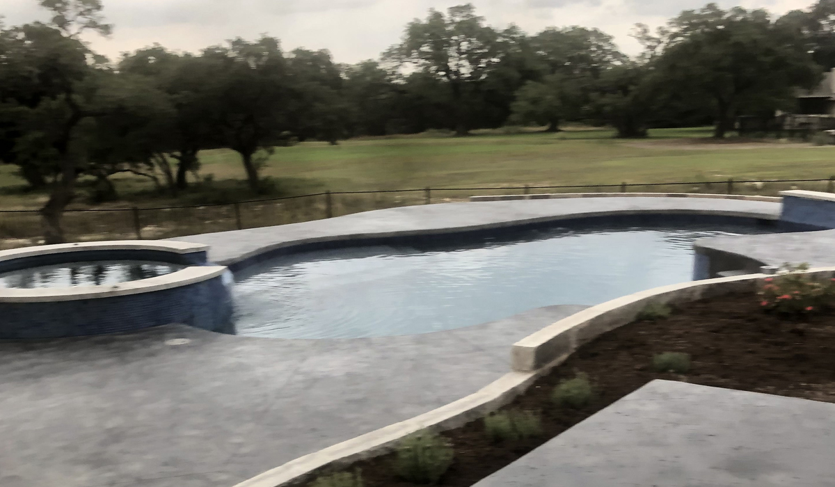 Water feature maintenance for a pool in Texas.